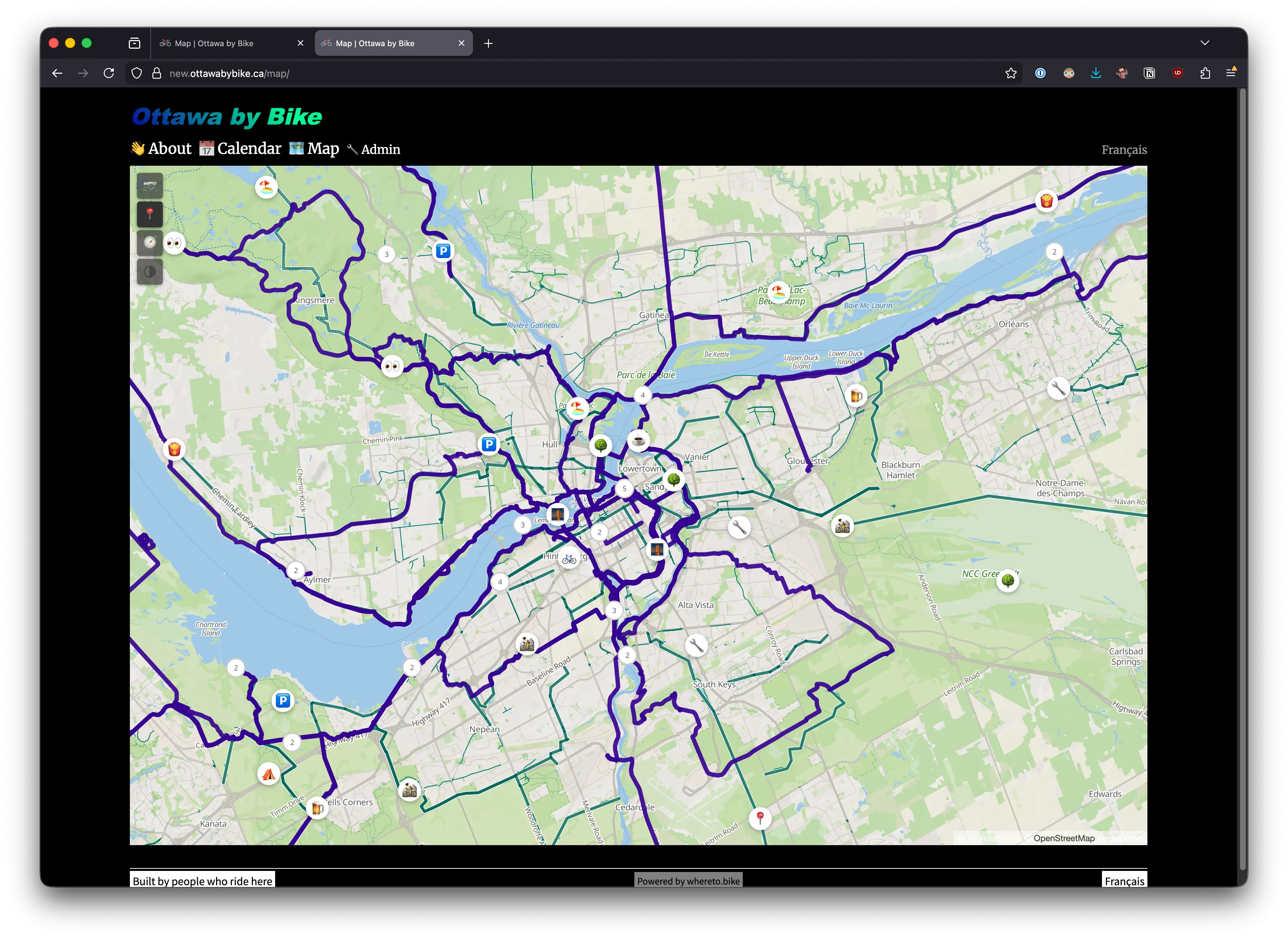 Wide view of Ottawa showing POI dots — camping sites visible from afar, water and bike infrastructure at medium zoom